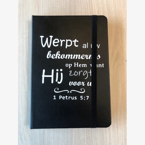 Notitieboekje met Bijbeltekst: 1 Petrus 5:7