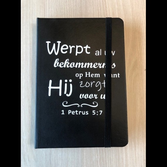 Notitieboekje met Bijbeltekst: 1 Petrus 5:7
